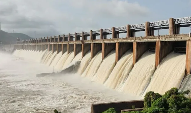 Dam Gate Collapse Spurs River Warning